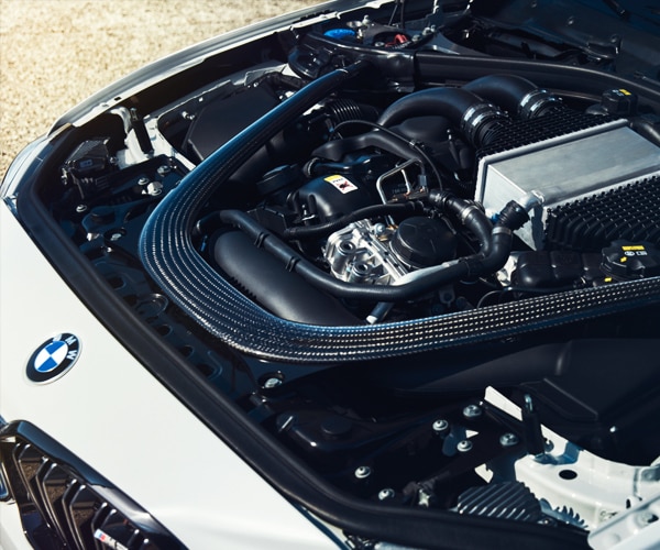 Detail of the S55 inline 6-cylinder engine in a BMW M2 CS Racing