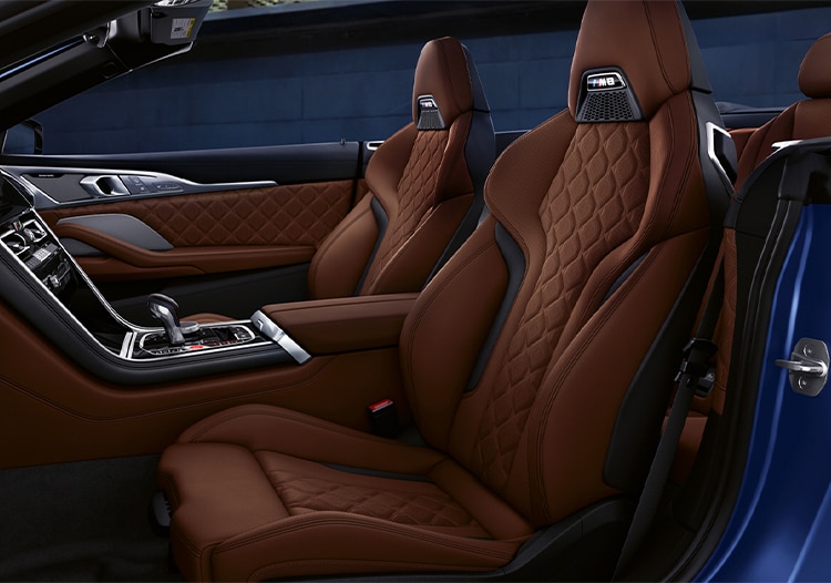 Detail of standard M Sport Seats with Extended Merino Leather Upholstery in a 2025 BMW M8 Competition Convertible