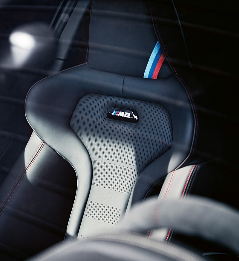 Detail of the lightweight M Sport Seats in leather and Alcantara with contrast red stitching in the Limited Edition BMW M2 CS